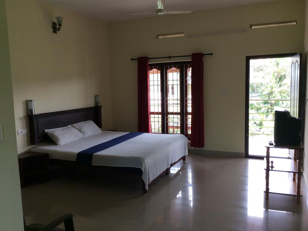 Апартаменты Kerala House Теккади Экстерьер фото